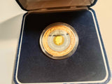 2002 $50 Manchester Commonwealth Games Trimetallic Coin.