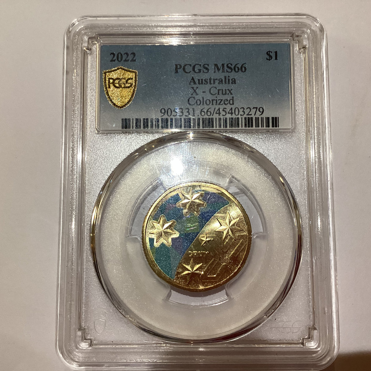 2022 $1 Coloured Crux. PCGS MS66. – Ensleigh Coins