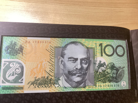 Two Generations of $100 Australian Banknotes