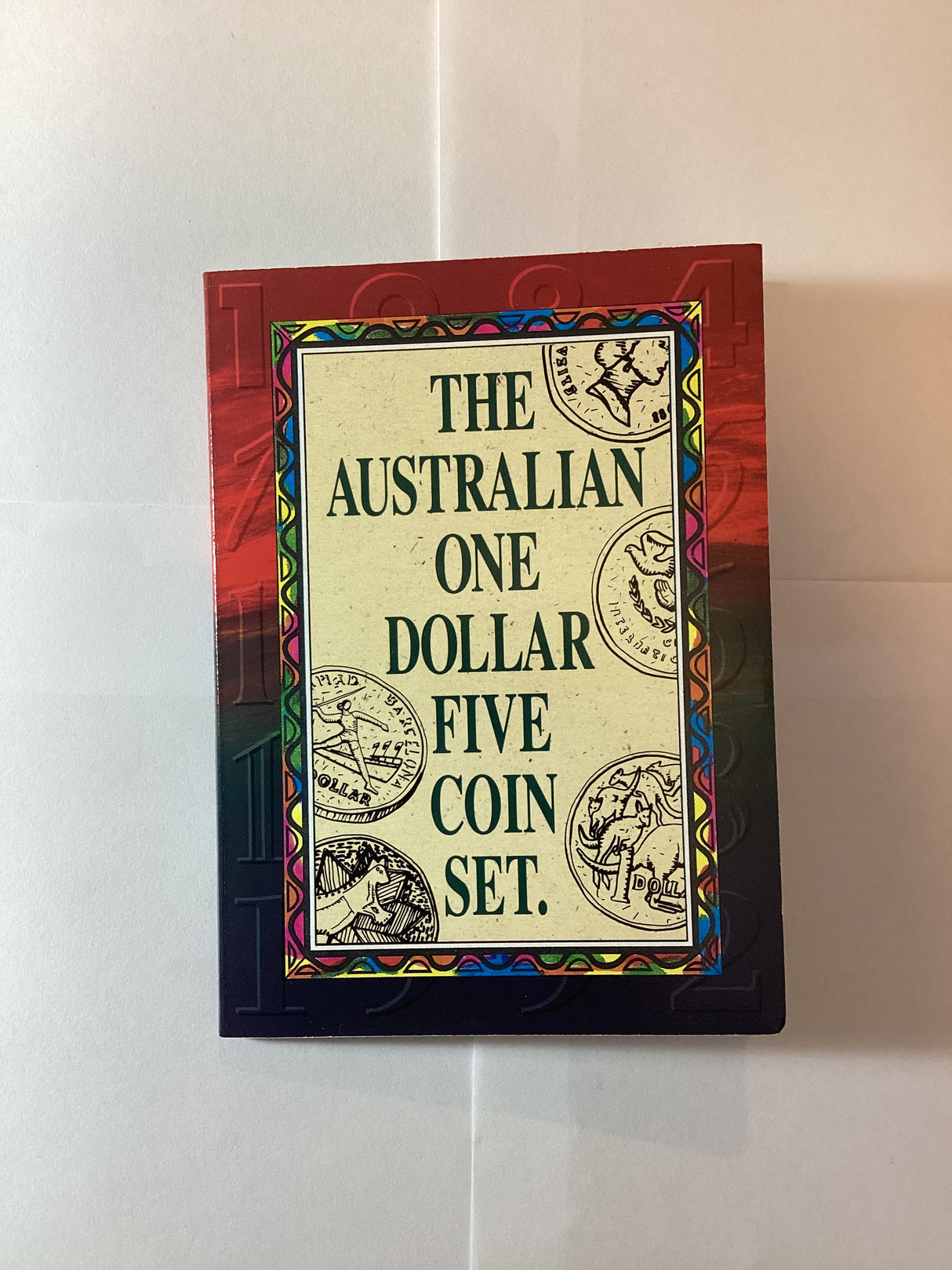 The Australian One Dollar Five coin set (has 1984, 1985, 1986, 1988, 1992). $1