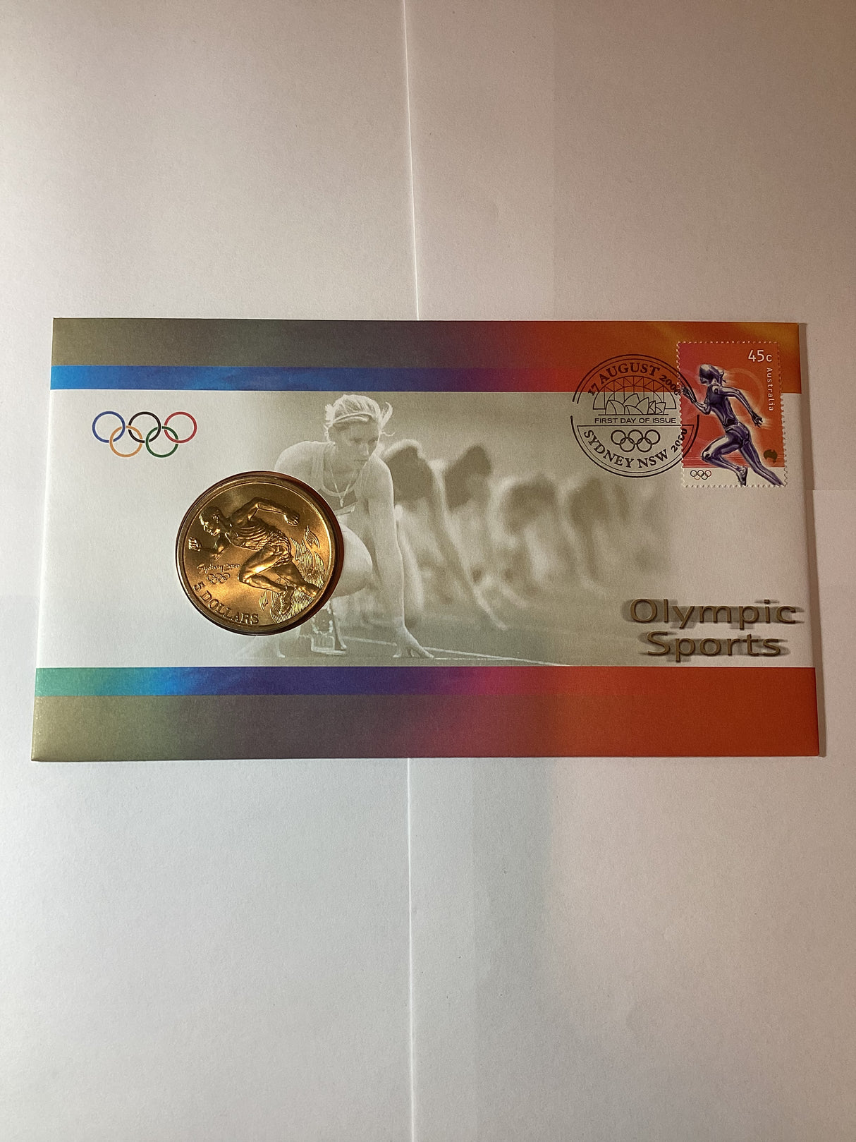 2000 Olympic sports $5 coin in envelope with stamp - Athletics