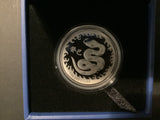 2013 $1 Year of the Snake Silver Coin. Blue Case.